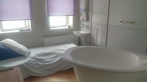 MLU room with bed and birthing pool