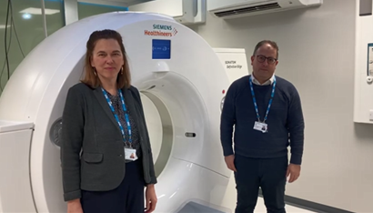 Executive Team standing at new CT Scanner